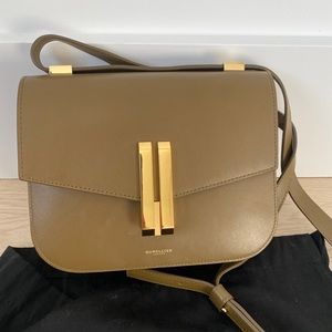 Selling Demellier light olive colour smooth leather made in Spain